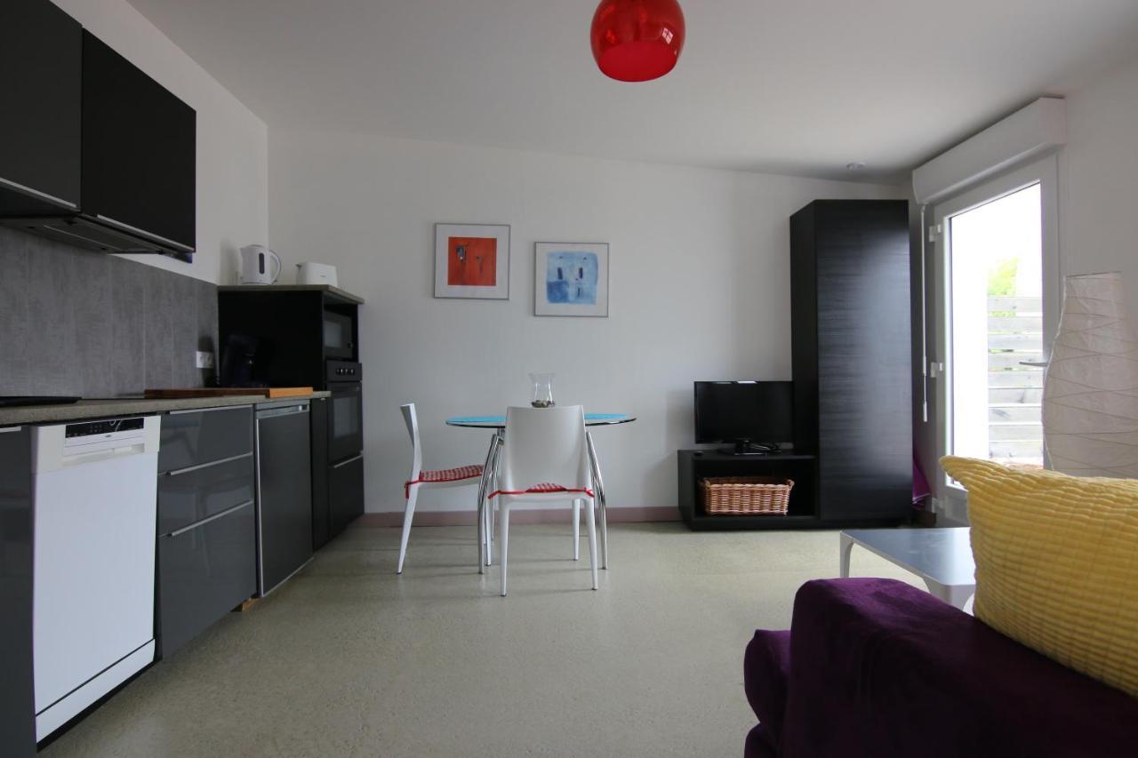 Cottages De La Ville Daniou Langrolay Esterno foto